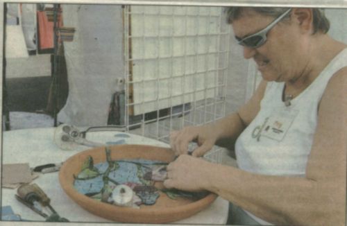 Peg working on mosaic