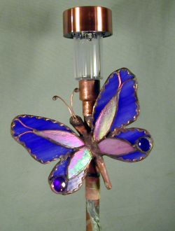 small solar
                light with butterfly